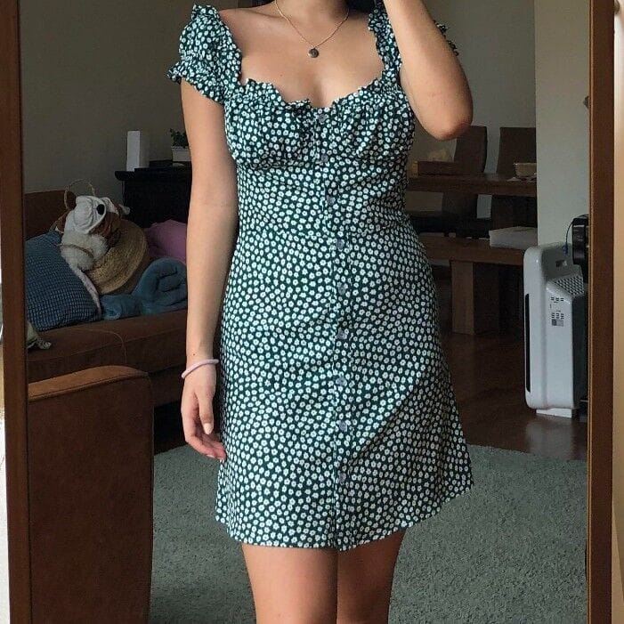 Image de petit robe verte fleurie en taille M grand