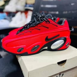 Product image for Nike Nocta Red and Black Sneakers