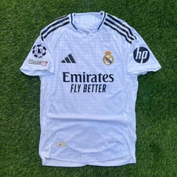Image du produit Maillot Troisième Tenue du Real Madrid 2024/25 - Orange & Noir