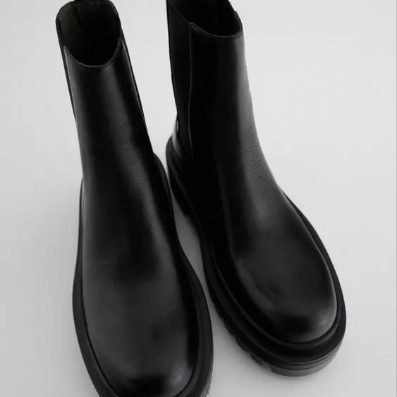 Image of black and gray zara ankle boots
